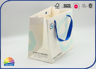 White Coated Paper Shopping Bags Custom Size Matte Lamination With Blue Handle